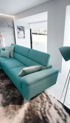 Greta — Modern, minimal sofa with extendable footrest and adjustable headrests.
