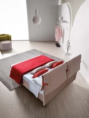 Primrose — Space-saving bed with a headboard featuring large padded cushions secured with buckles.