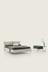 Ischia — Bed with a headboard made of a large, comfortable, and movable cushion.