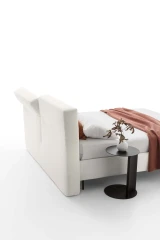 Duo — Bed with an upholstered headboard equipped with an adjustable mechanism.
