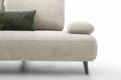 Fanny — Modular sofa with organic shapes, sliding backrests, and adjustable armrests
