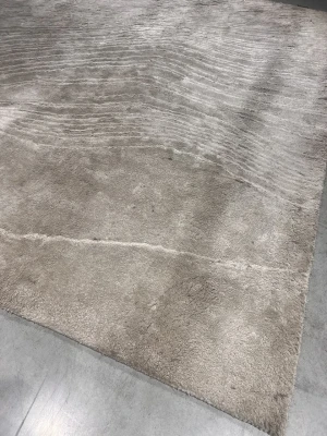 Tide paklājs