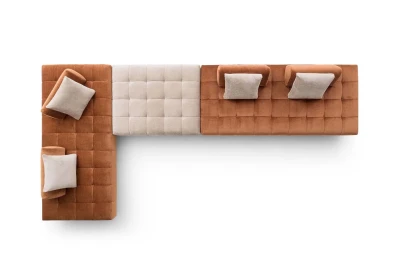 Bowie — Quilted modular sofa with high legs and smooth sliding backrests.
