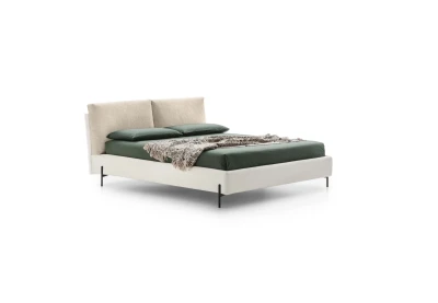 Ischia — Bed with a headboard made of a large, comfortable, and movable cushion.