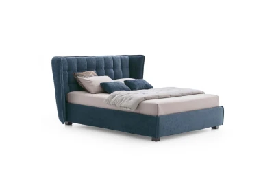 Aspen — Wingback bed with a quilted headboard.