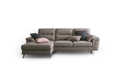 Cupido — Sofa with extendable footrest, asymmetrical corner seating, and rounded armrests.
