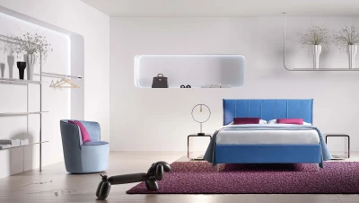 Plumeria — Space-saving bed with a vertically stitched padded headboard.