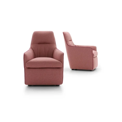 Bangkok — Armchair with a high backrest, comfortable armrests and stitching details that outline its structure. A blend of classic and modern styles.