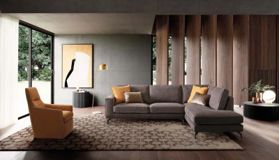 Spencer — Modern sofa with bicolor raised borders and lateral decorative buttons.
