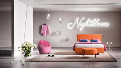 Mirabilis — Space-saving bed with a padded headboard featuring an envelope-shaped detail.