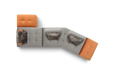 Reed light — Space-saving quilted modular sofa with low legs and smooth sliding backrests.