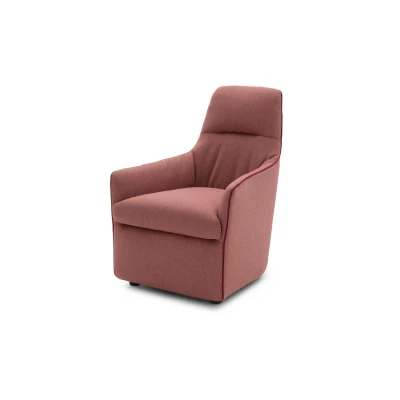 Bangkok — Armchair with a high backrest, comfortable armrests and stitching details that outline its structure. A blend of classic and modern styles.