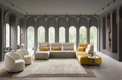 Byron — Modular sofa with high, sliding backrests for adjustable seating depth.