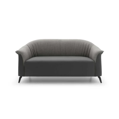 Caroline Loveseat — Two-seater sofa with bicolor upholstery customization options.
