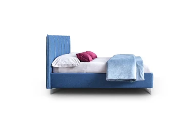 Plumeria — Space-saving bed with a vertically stitched padded headboard.