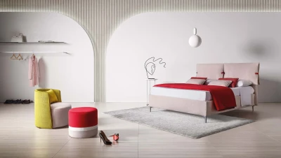 Primrose — Space-saving bed with a headboard featuring large padded cushions secured with buckles.