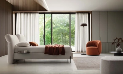 Duo — Bed with an upholstered headboard equipped with an adjustable mechanism.