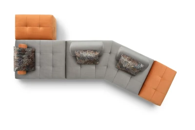 Reed light — Space-saving quilted modular sofa with low legs and smooth sliding backrests.