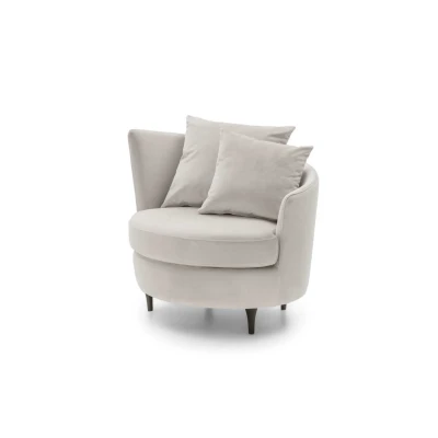 Privè — Elegant armchair with cushions resting on a slim, asymmetrical, and enveloping backrest.