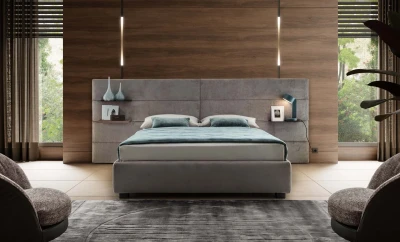 Horizon — Contract bed with a horizontally padded headboard and side shelves.