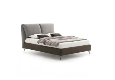 Fold — Bed with a headboard made of large adjustable cushions.