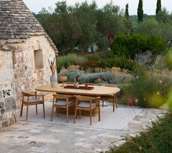 Natural textures, durable materials and thoughtful details help the outdoor space become an extension of the home.